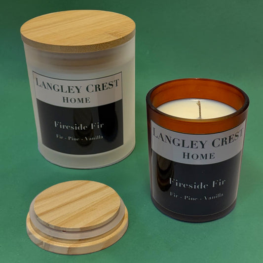 Fireside Fir hand-poured candle in amber glass jar, pine balsam tonka scent